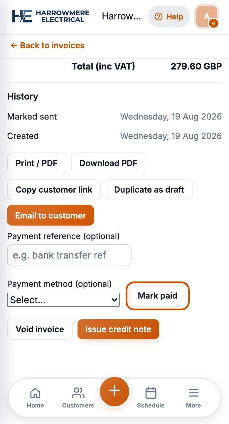 Invoice with Mark paid on a phone